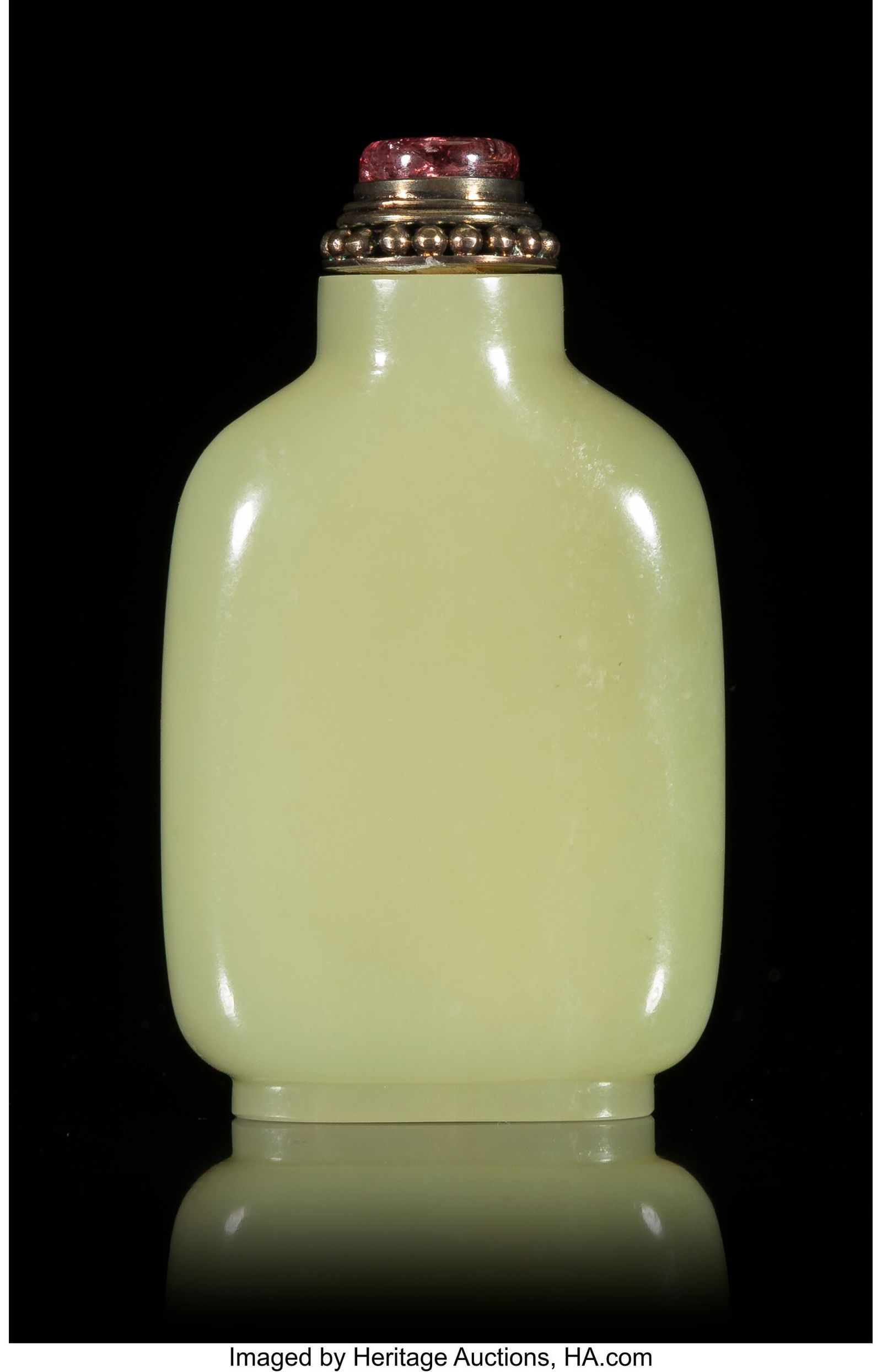 A Chinese Carved Yellow Jade Snuff Bottle with T (1 of 2)