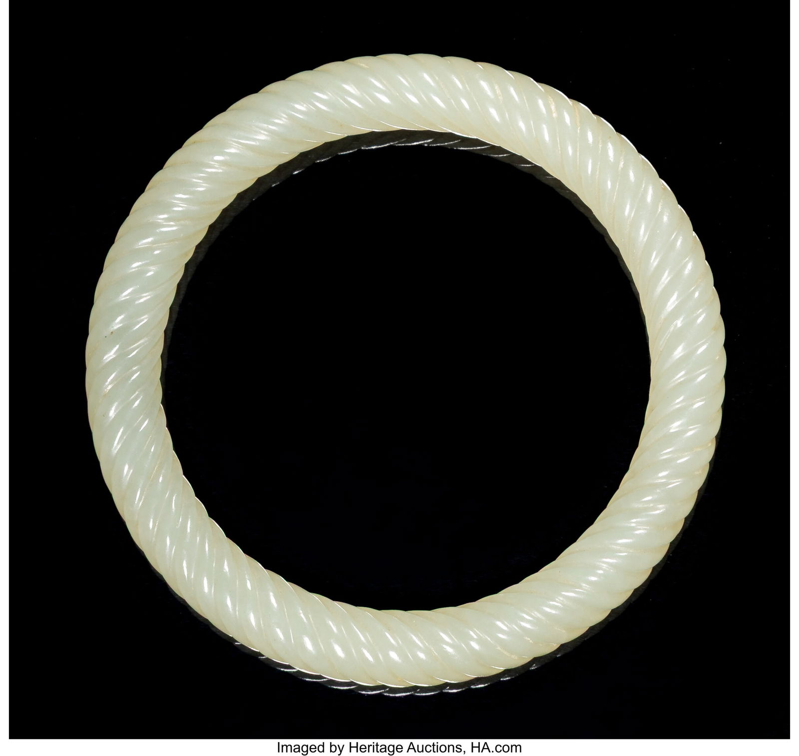 A Chinese Carved White Jade Rope-Twist Bangle, Q (1 of 2)