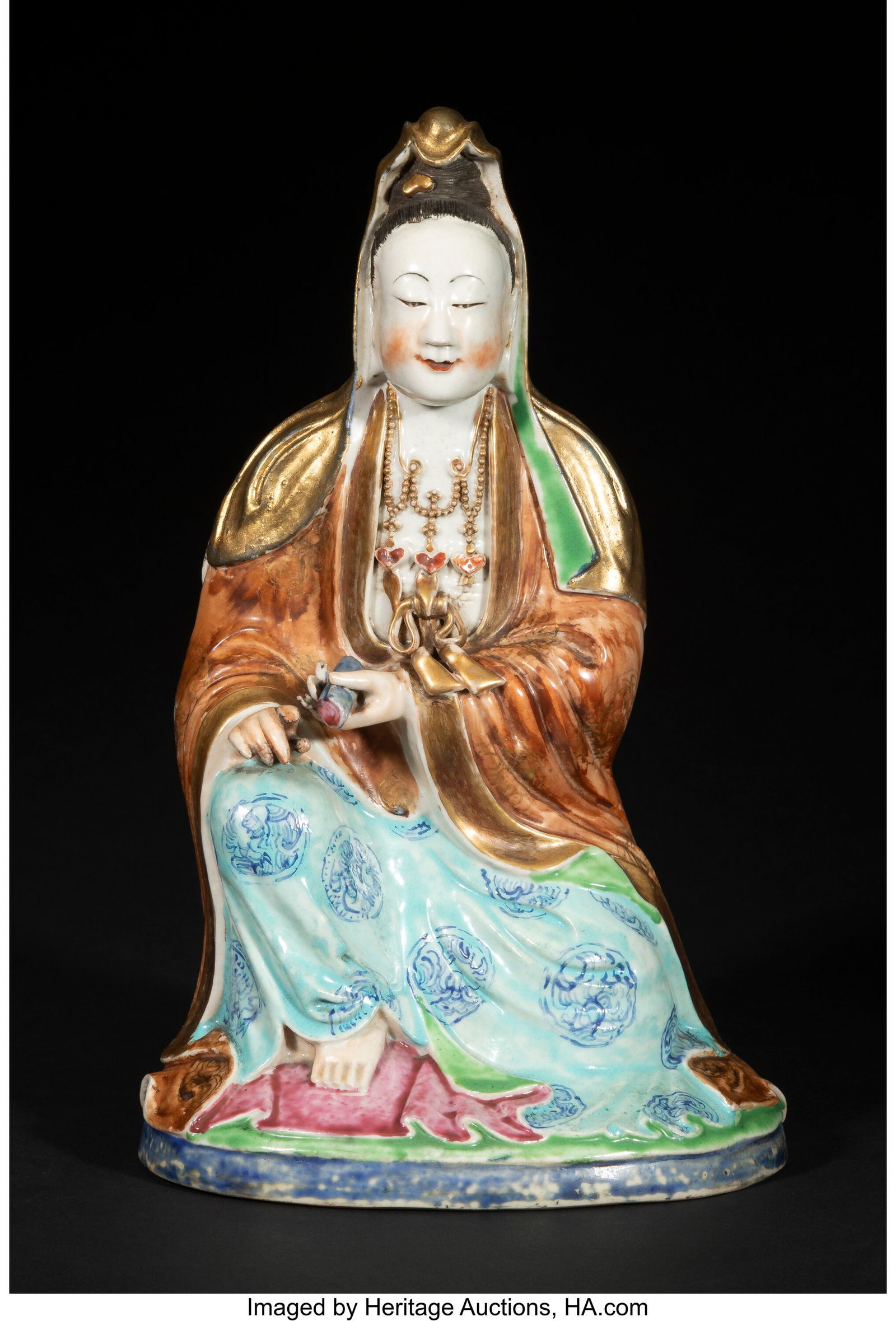 A Chinese Famille Rose Figure of Guanyin, 19th c: A Chinese Famille Rose Figure of Guanyin, 19th century 11-3/8 x 6-3/4 x 5 inches (28.9 x 17.1 x 12.7 cm) PROVENANCE: From a Chicago Estate; Bonh