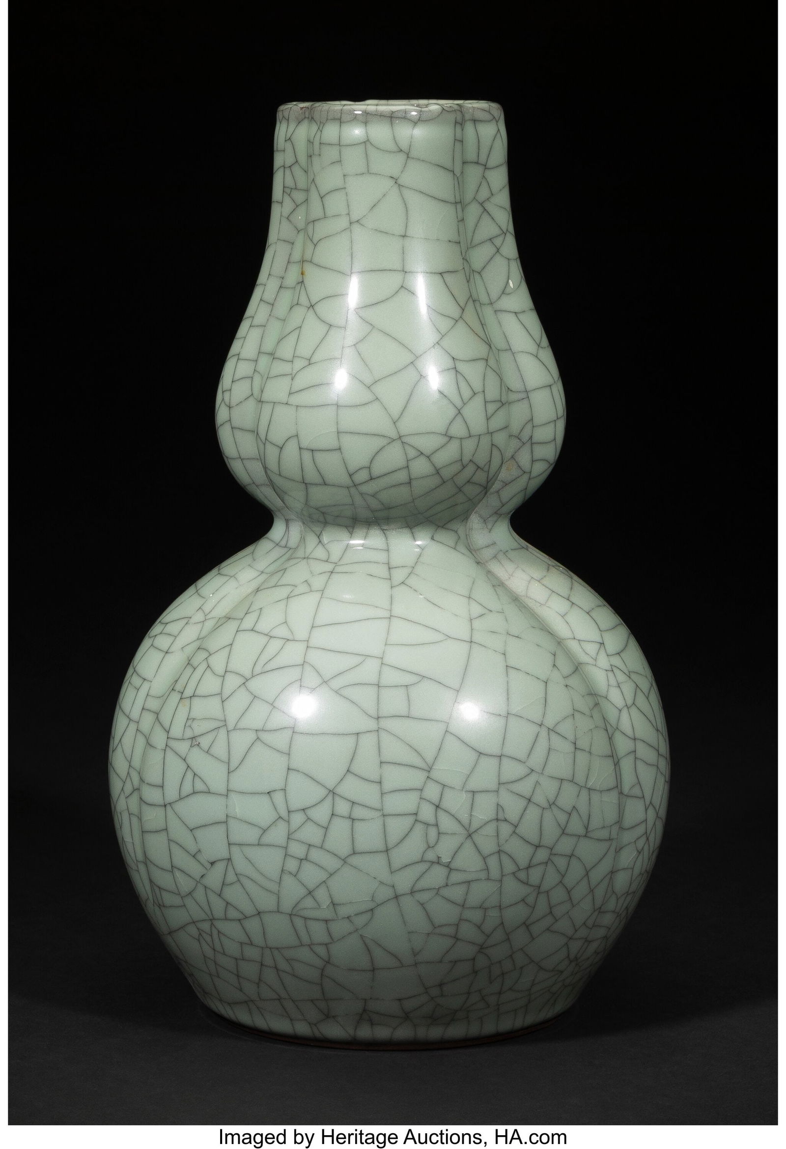 A Chinese Guan-Type Celadon Glazed Conjoined Dou (1 of 3)