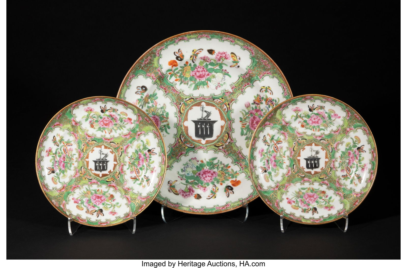 A Group of Three Chinese Export Rose Canton Armo: A Group of Three Chinese Export Rose Canton Armorial Dishes, circa 1875 1-3/4 x 9-3/4 inches (4.4 x 24.8 cm) (largest, diam.) each plate wi