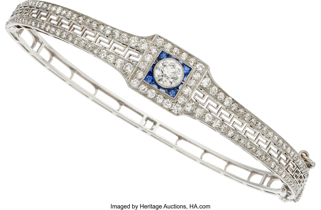 Art Deco Diamond, Sapphire, Platinum Bracelet S: Art Deco Diamond, Sapphire, Platinum Bracelet Stones: Round brilliant-cut diamond weighing approximately 0.50 carat; full-cut diamonds weighing a total of approximately 1