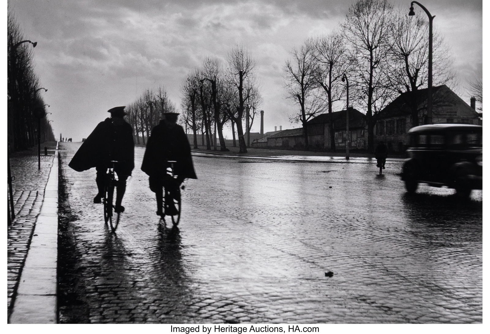 Robert Doisneau (French, 1912-1994) Deux Agents: Robert Doisneau (French, 1912-1994) Deux Agents Cyclistes Sous La Pluie, 1943 Gelatin silver print, printed 1980s 9-1/8 x 13-3/8 inches (23.2 x 33&perio