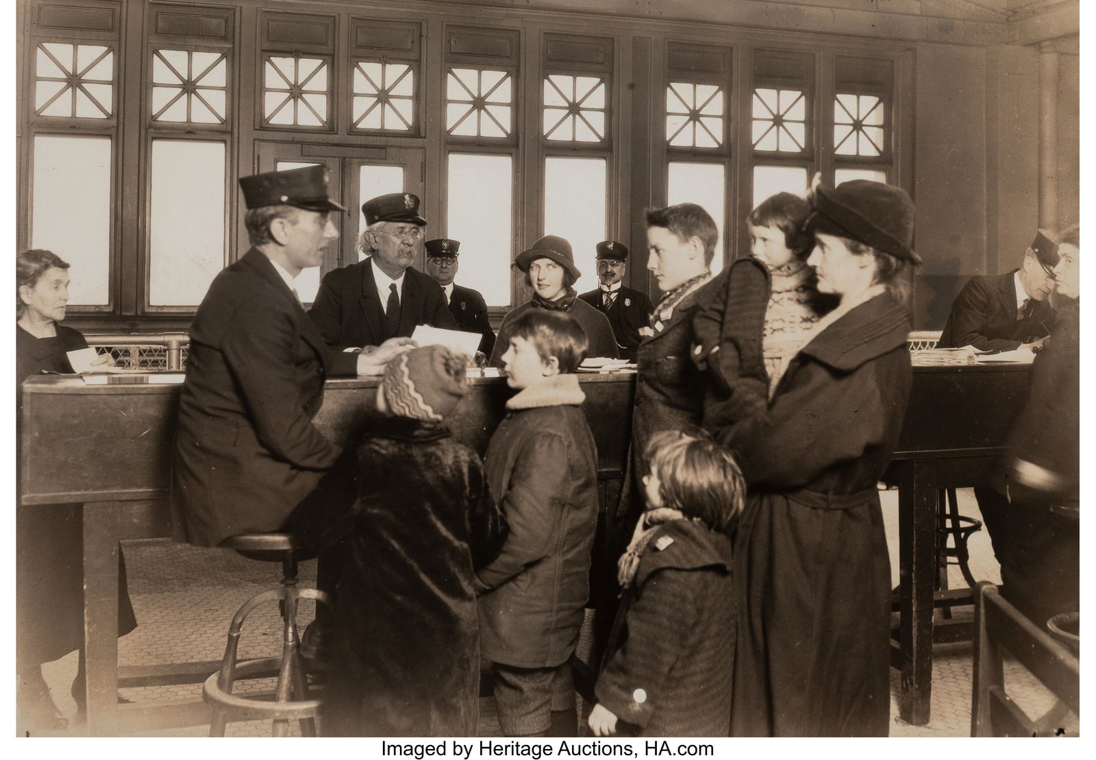 Lewis Wickes Hine (American, 1874-1940) Interpre: Lewis Wickes Hine (American, 1874-1940) Interpreter Interviews a Family, Ellis Island, 1926 Gelatin silver print, printed later 4-7/8 x 6-7/8 inches (12&