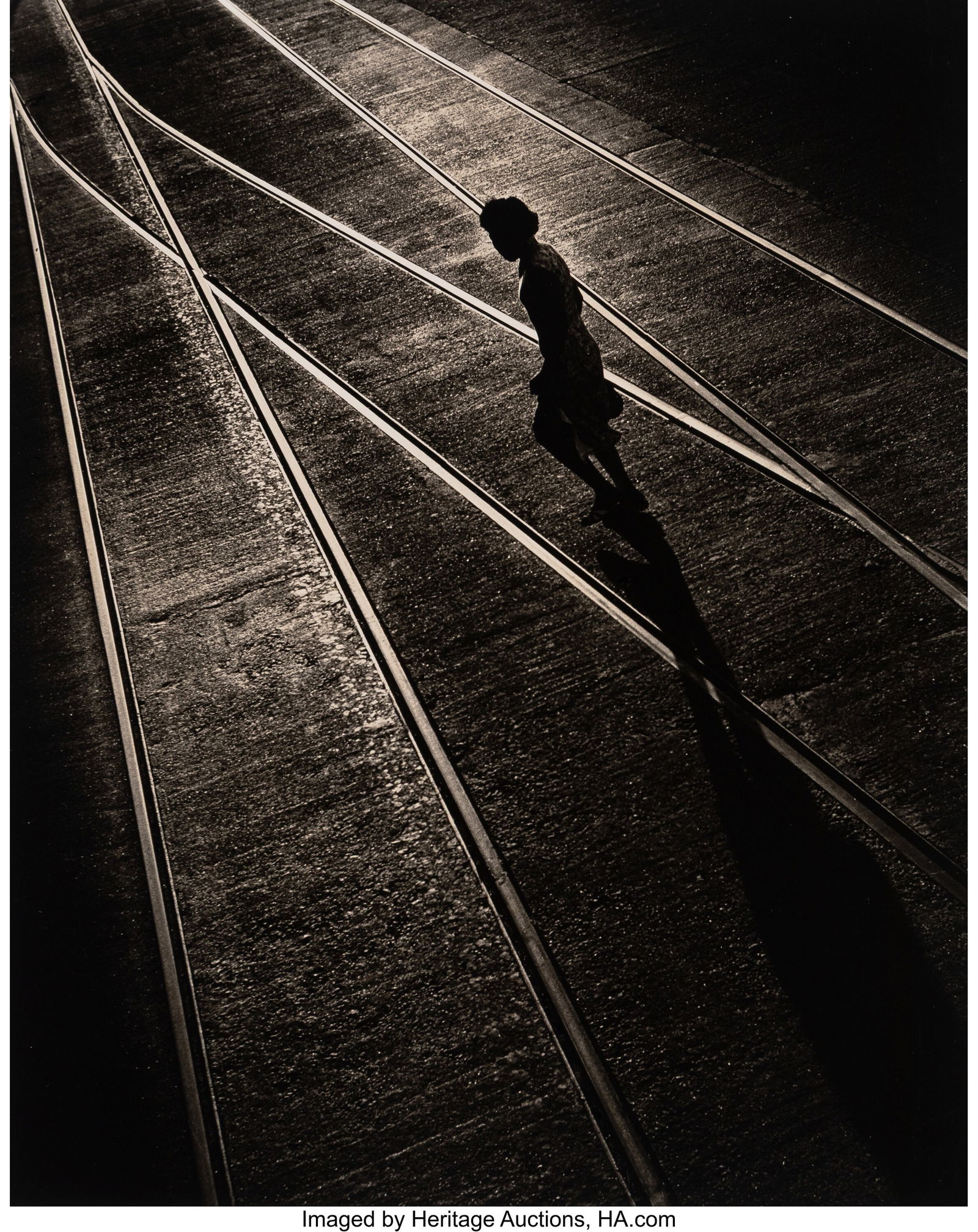 Fan Ho (Chinese, 1931-2016) Along the Tracks, Ho: Fan Ho (Chinese, 1931-2016) Along the Tracks, Hong Kong, 1955 Oversized gelatin silver print, ferrotyped 19 x 15 inches (48.3 x 38.1 cm) &lpar