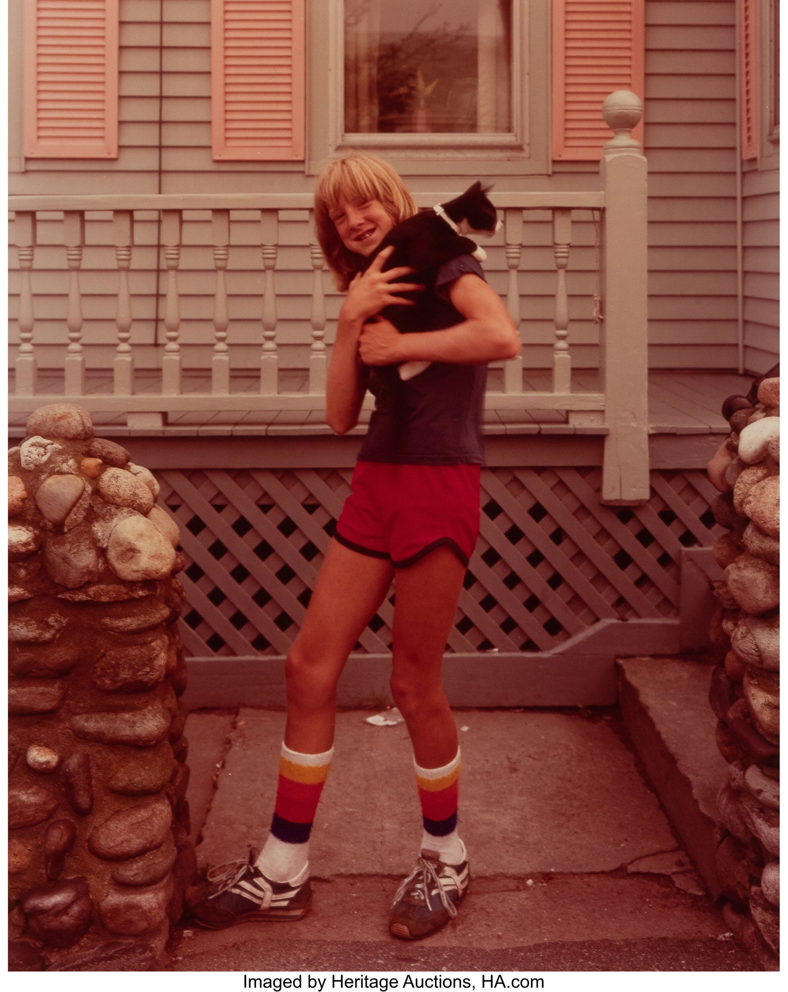 Joel Meyerowitz (American, b. 1938) Untitled (Cr: Joel Meyerowitz (American, b. 1938) Untitled (Cradling Cat), Cape Cod, Massachusetts, 1981 Dye coupler print 9-1/2 x 7-1/2 inches (24&pe