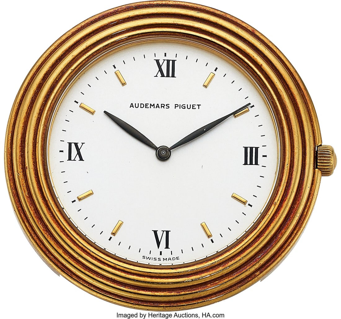 Audemars Piguet, Rare Ref. 5093 "Disco Volante",: Audemars Piguet, Rare Ref. 5093 "Disco Volante", circa 1970's Case: 35 mm, 18k yellow gold, two body, multi-stepped bezel, solid back with screw down