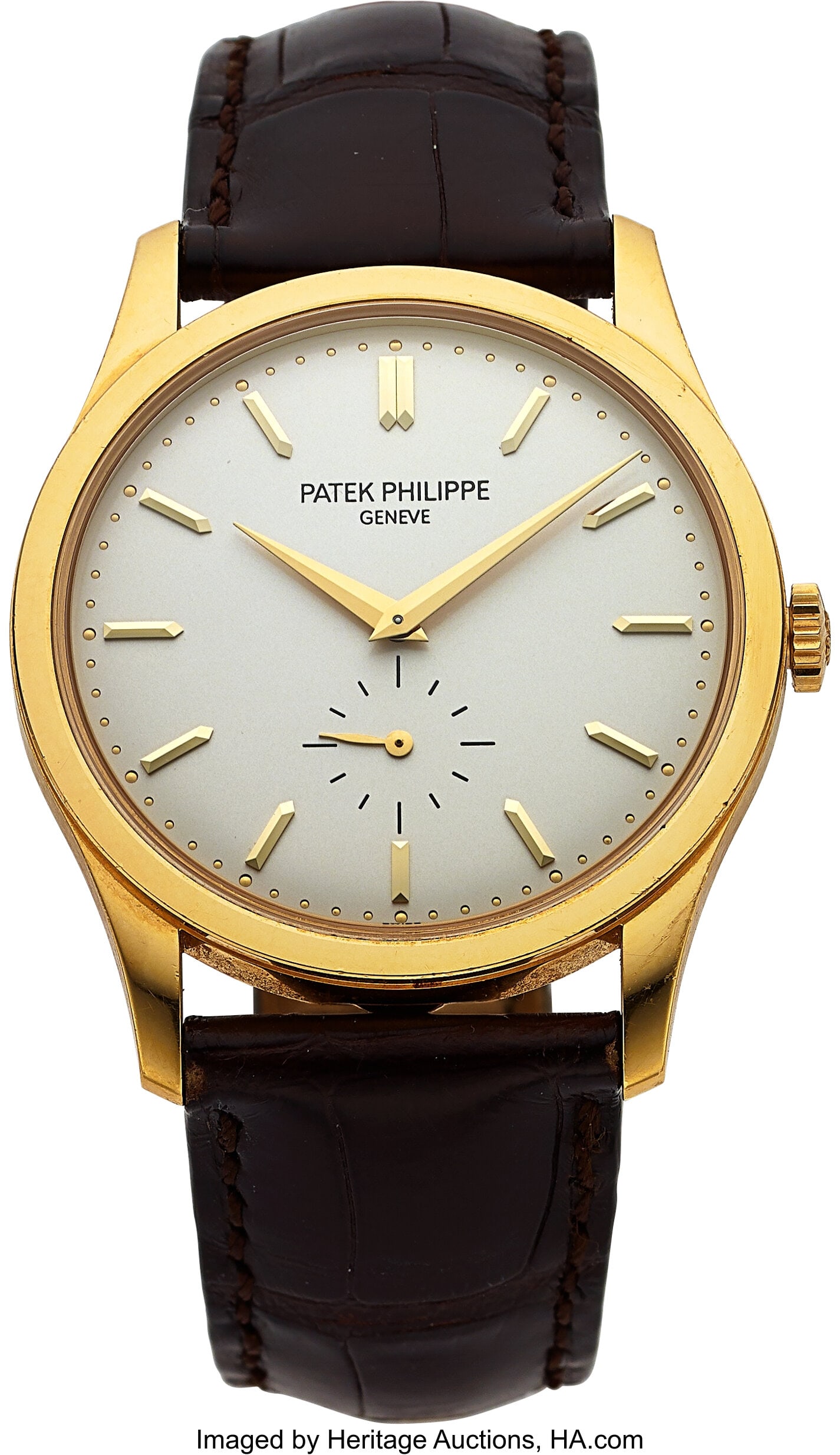 Patek Philippe, Ref. 5196J-001 Very Fine 37 mm C: Patek Philippe, Ref. 5196J-001 Very Fine 37 mm Calatrava Gold Wristwatch, circa 2010 Case: 37 mm, 18k gold, two body, polished and brushed,