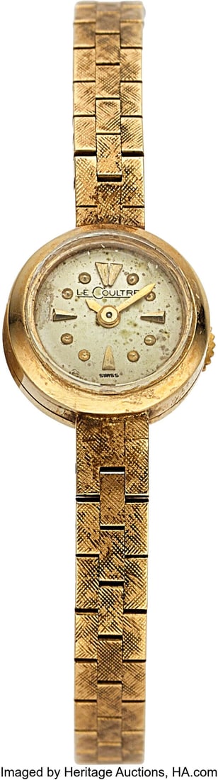Jaeger LeCoultre Ladies 14K Yellow Gold Lilliput: Jaeger LeCoultre Ladies 14K Yellow Gold Lilliputian Wrist Watch Case: 13 mm, 14k gold, two body with back wind crown Dial: white dial with gold arrows at 3, 6,