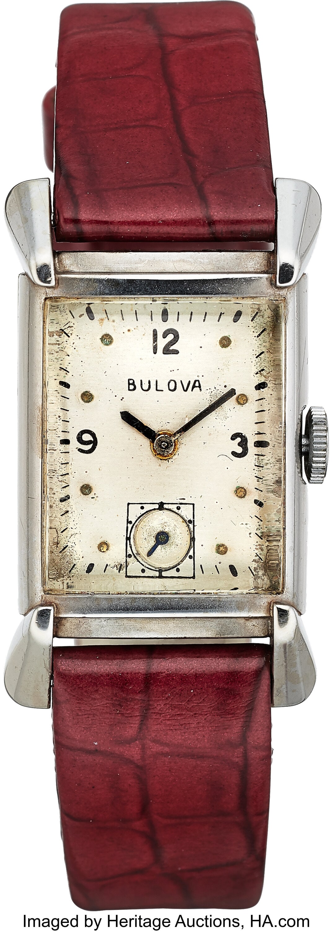Bulova 14k White Gold Tank Case: 21 mm x 28 mm,: Bulova 14k White Gold Tank Case: 21 mm x 28 mm, 14k white gold, two body, snap-on case back, No. 6453114 Dial: silvered dial, black Arabic