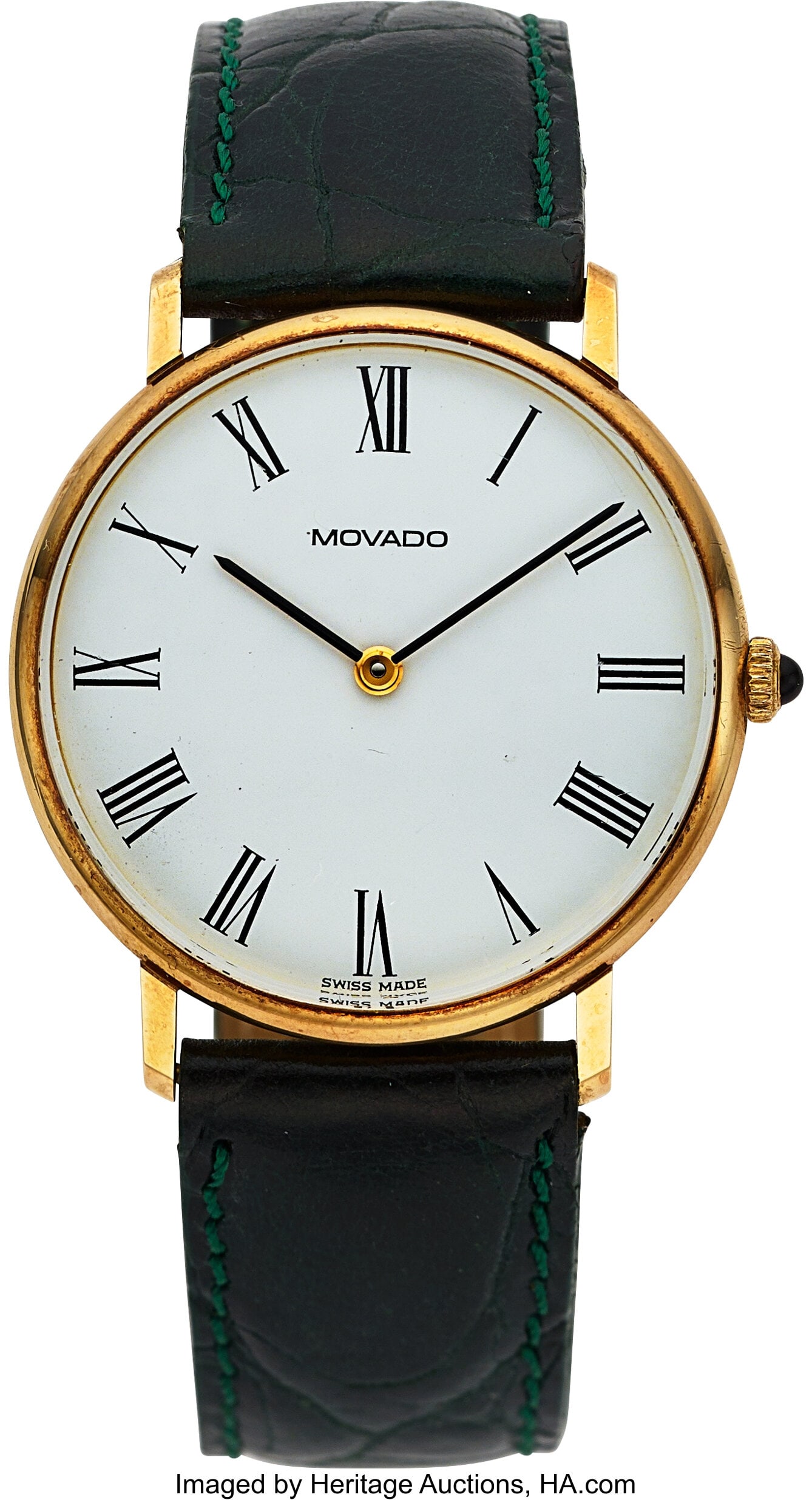 Movado Zenith 14k Yellow Gold Dress Watch Case: Movado Zenith 14k Yellow Gold Dress Watch Case: 33 mm, 14k, two body, snap-on case back, gem set crown, No. 561180172 Dial: white dial with black Roman