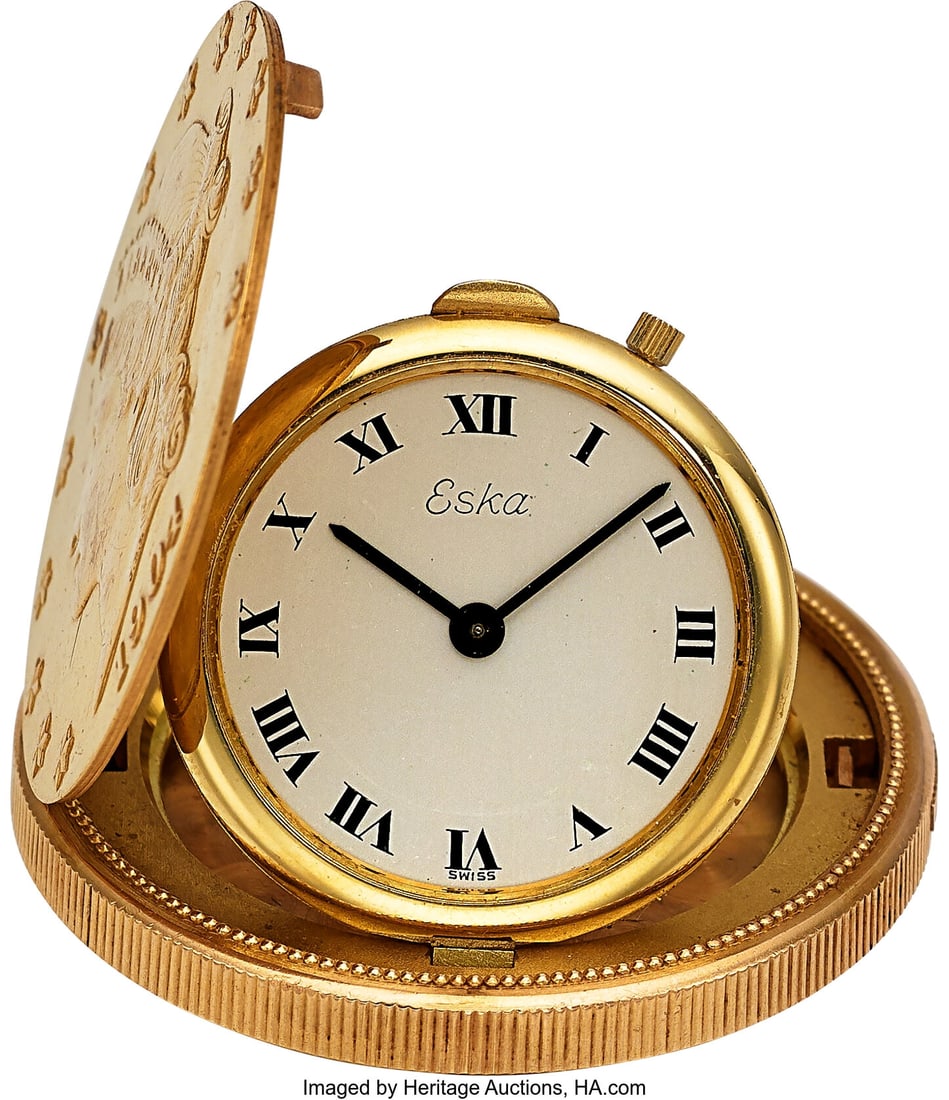 Eska, Fine $20 1904 Gold Coin Watch, circa 1960': Eska, Fine $20 1904 Gold Coin Watch, circa 1960's Case: 34 mm, 22k gold coin, 18k gold inner case, 1904 Liberty $20 gold coin, recessed and hing