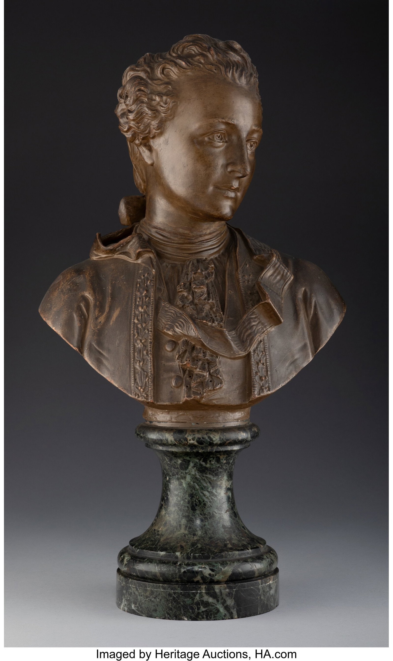 A Terracotta Bust of a French Nobleman, 19th cen: A Terracotta Bust of a French Nobleman, 19th century 19-1/4 x 10-3/4 x 7-1/2 inches (48.9 x 27.3 x 19.1 cm) PROVENANCE: Skinner, Inc&period