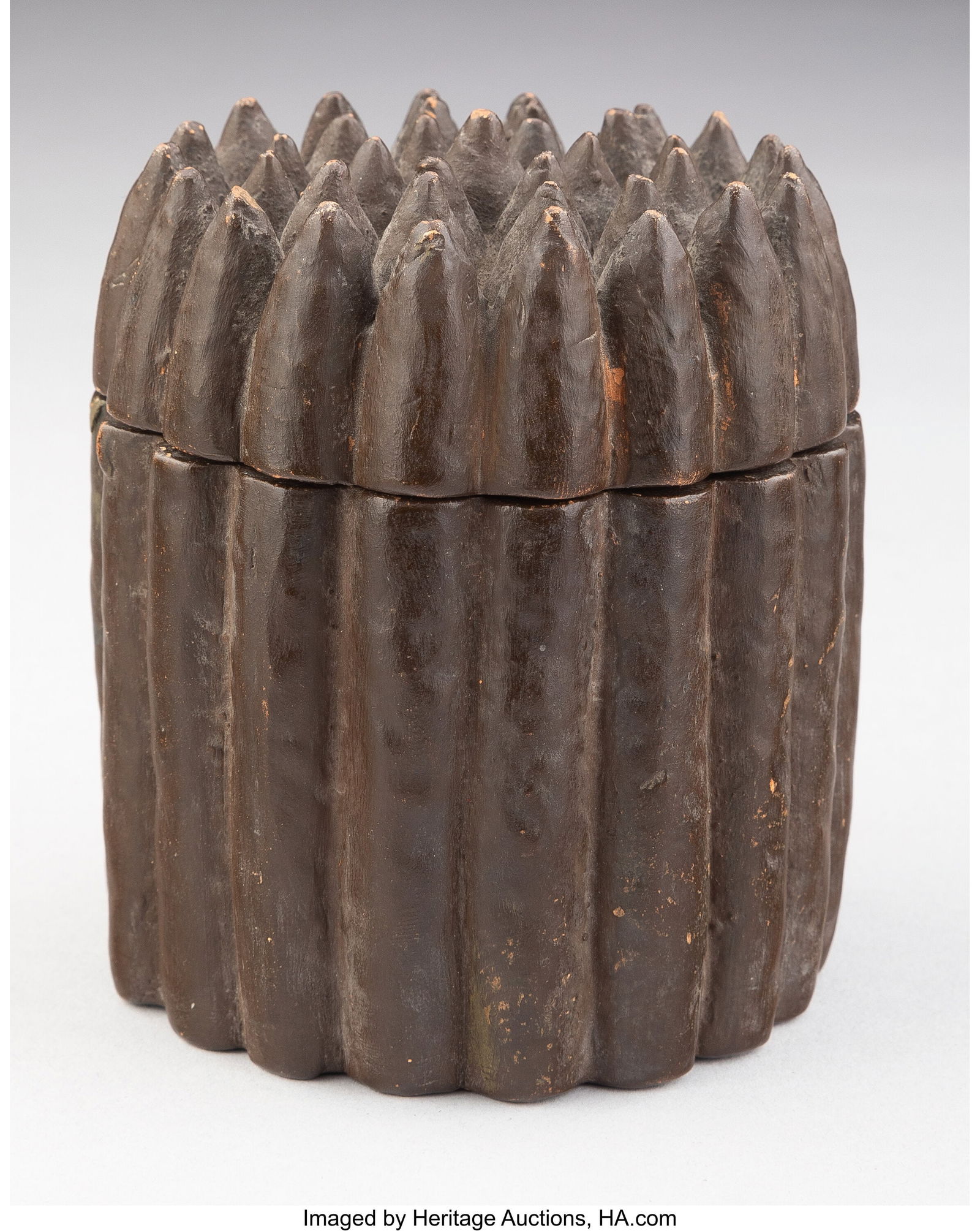 A Glazed Ceramic Cigar-Form Covered Tobacco Jar: A Glazed Ceramic Cigar-Form Covered Tobacco Jar Marks: JJS 4 x 3-1/4 x 3-1/4 inches (10.2 x 8.3 x 8.3 cm) Property from the Collection of Frederick H&perio