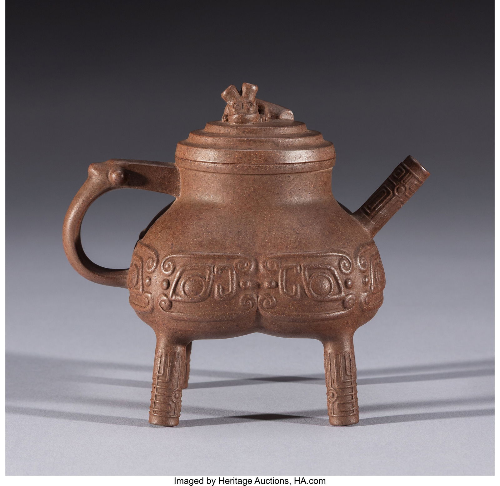 A Chinese Zisha Teapot Marks: (two character mar: A Chinese Zisha Teapot Marks: (two character mark) 4-1/2 x 3-3/8 x 5 inches (11.4 x 8.6 x 12.7 cm) HID03101062020 © 2026 Heritage Auctions &