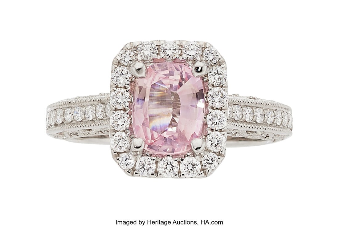 Padparadscha Sapphire, Diamond, White Gold Ring: Padparadscha Sapphire, Diamond, White Gold Ring Stones: Cushion-shaped padparadscha sapphire weighing 1.42 carats; full-cut diamonds weighing a total of 0.61 carat