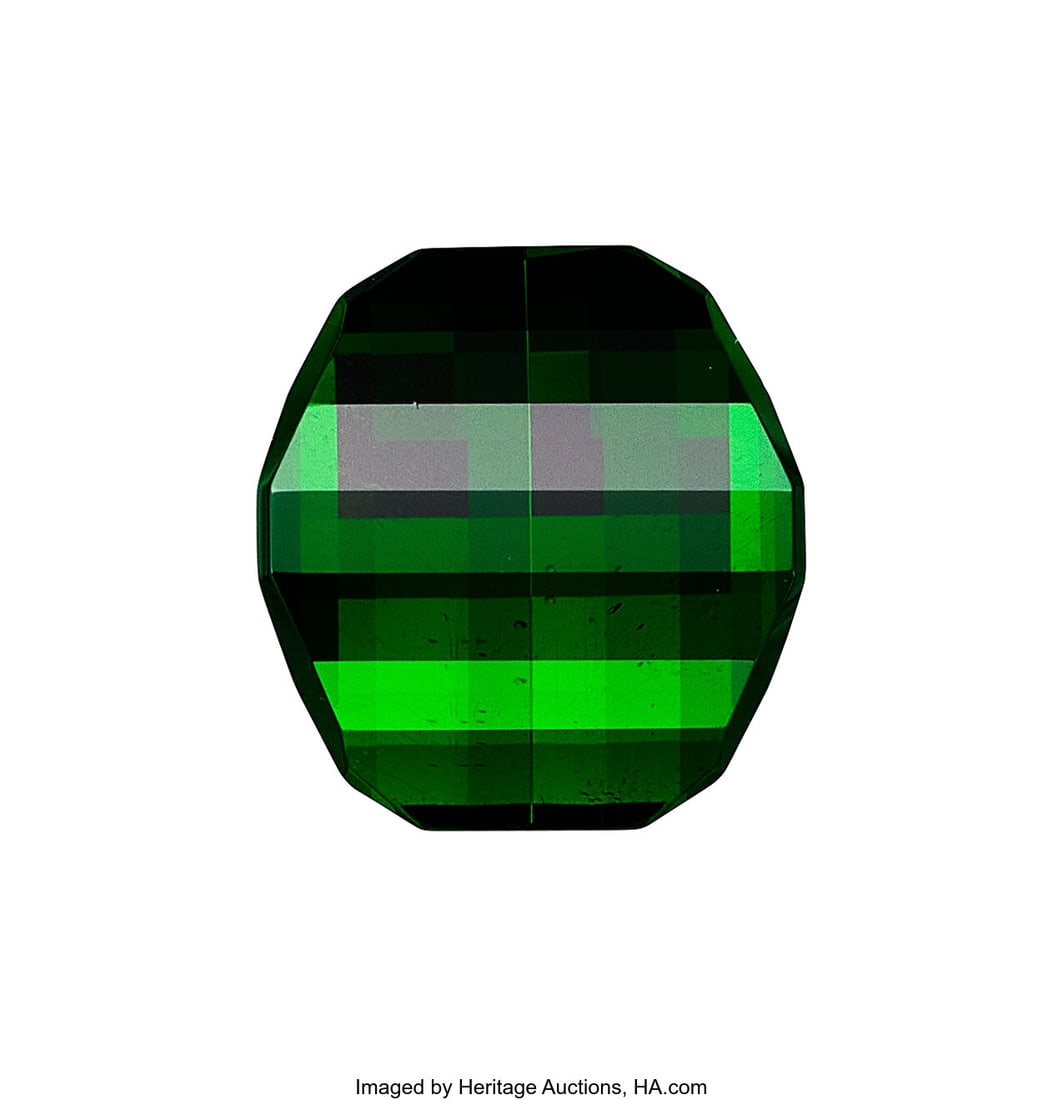 4.20 ct Tsavorite Garnet Shape: Novelty Step Cu: 4.20 ct Tsavorite Garnet Shape: Novelty Step Cut Measurements: 10.36 x 9.65 x 5.80 mm Report: GIA # 5232773985 HID03101062020 © 2026 Heritage Auc