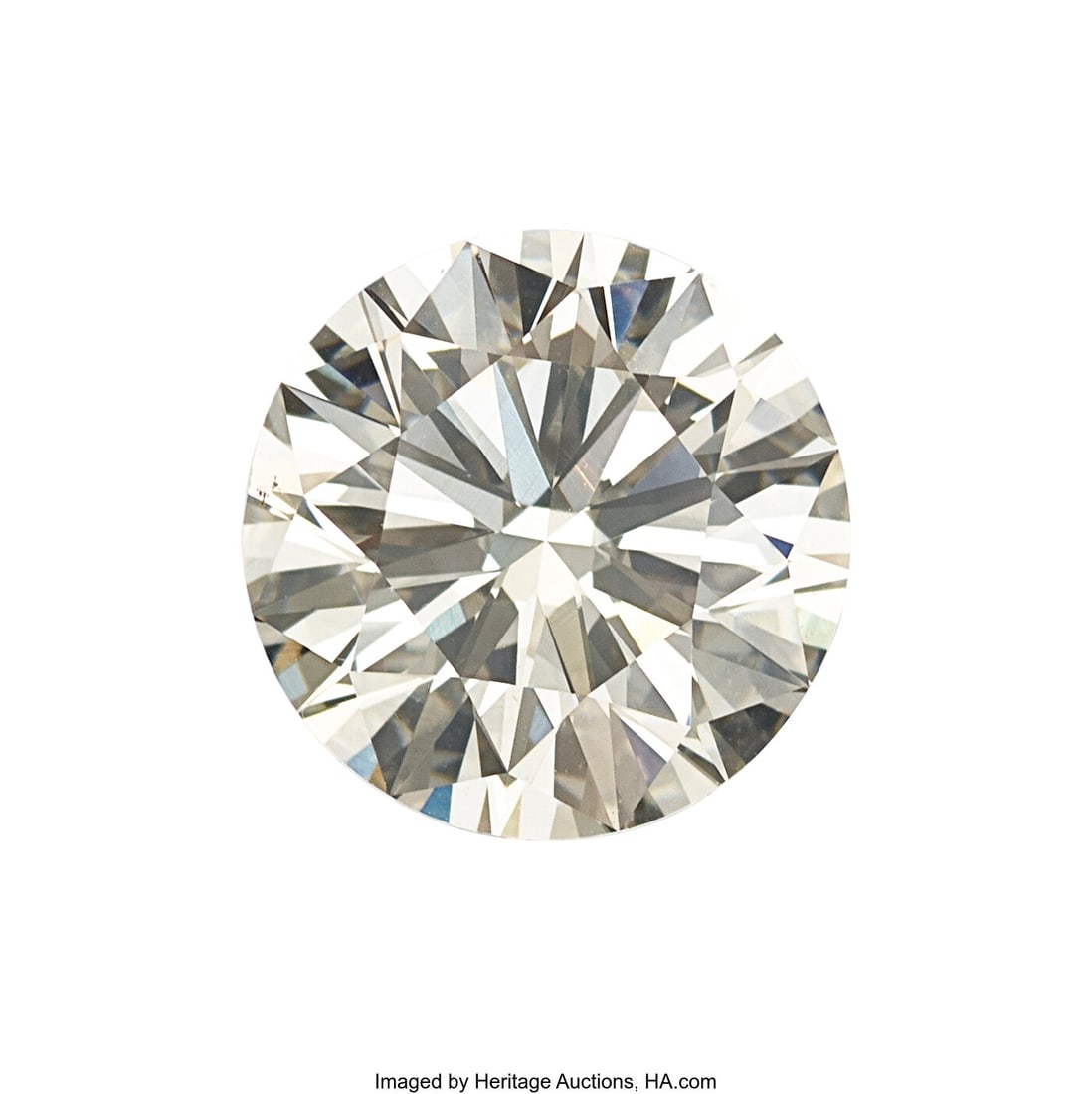 3.34 ct Diamond Shape: Round brilliant-cut Mea: 3.34 ct Diamond Shape: Round brilliant-cut Measurements: 9.60 - 9.69 x 5.84 mm Color: N, Very Light Brown Clarity: VS1 Report: GIA #