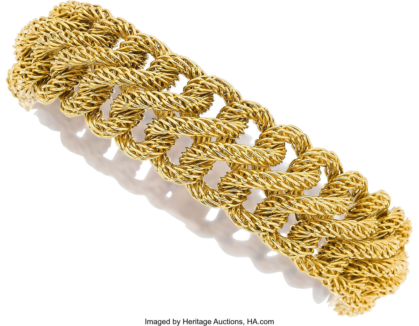 Tiffany & Co. Gold Bracelet, French Metal: 18k: Tiffany & Co. Gold Bracelet, French Metal: 18k gold Marked: Tiffany & Co; French hallmarks Weight: 87.90 grams Dimensions: 7 inches x 3/4 i