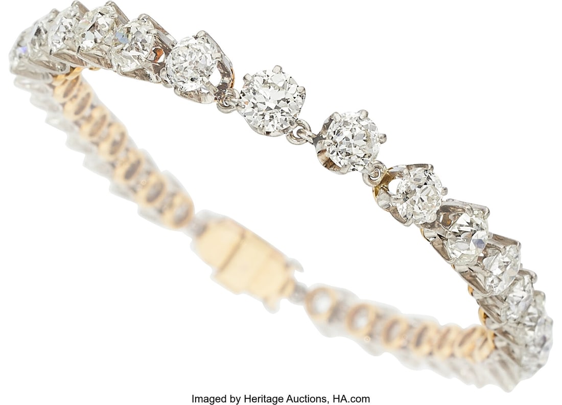 Diamond, Platinum-Topped Gold Bracelet Stones: Diamond, Platinum-Topped Gold Bracelet Stones: European-cut diamonds weighing a total of approximately 6.50 carats Metal: Platinum-topped 18k gold Gross Weight: 11&perio
