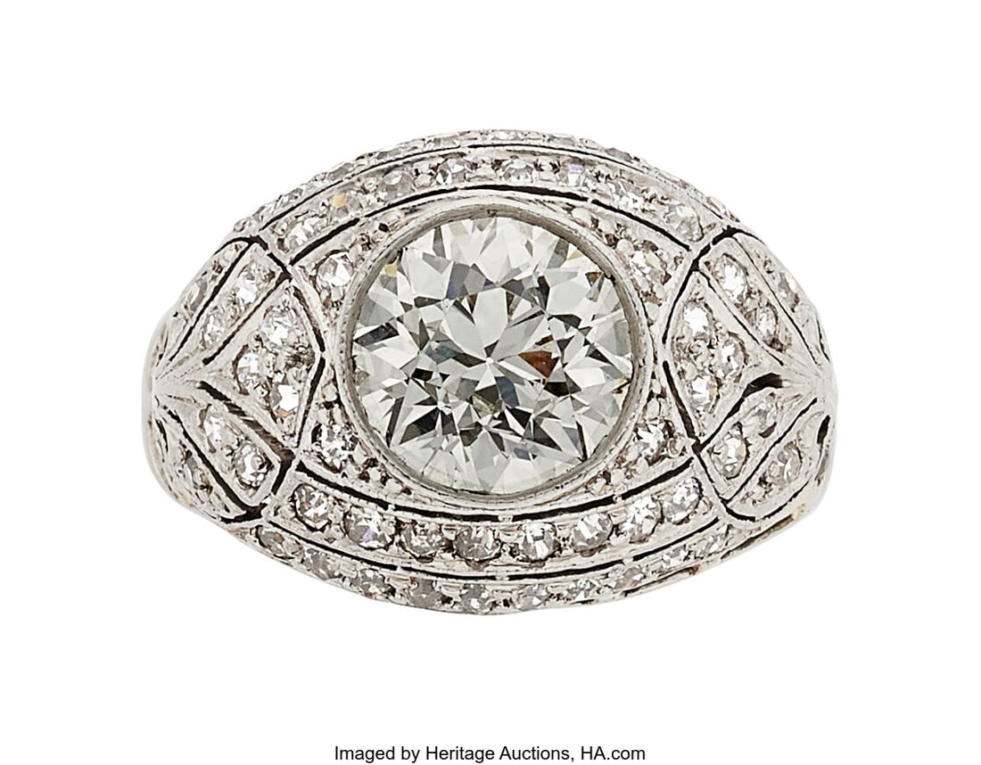 Diamond, Platinum Ring Stones: European-cut dia: Diamond, Platinum Ring Stones: European-cut diamond weighing approximately 1.65 carats; single-cut diamonds weighing a total of approximately 0.60 carat Metal: Pla