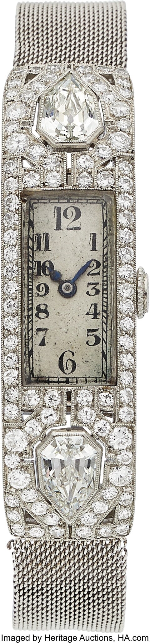 Swiss Art Deco Diamond, Platinum Watch Case: 48: Swiss Art Deco Diamond, Platinum Watch Case: 48 x 13 mm, rectangle, platinum, snapback, diamond-set bezel Dial: Silvered dial, black handpainted Arabic