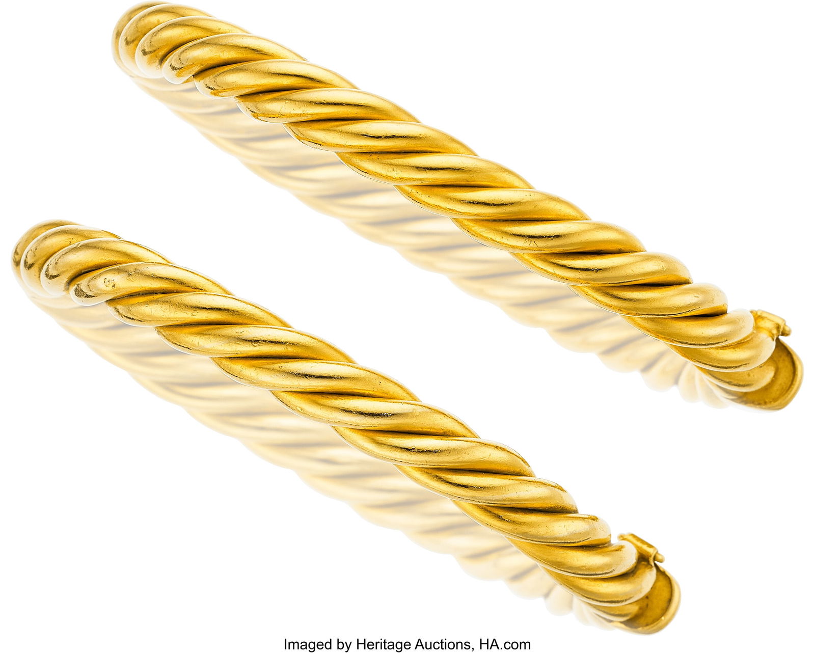 Lalaounis Gold Bracelets Metal: 18k gold Marked: Lalaounis Gold Bracelets Metal: 18k gold Marked: for Lalaounis Weight: 97.80 grams Dimensions: 6-3/4 inches x 1/4 inch HID03101062020 © 2026 Heritage Auctio