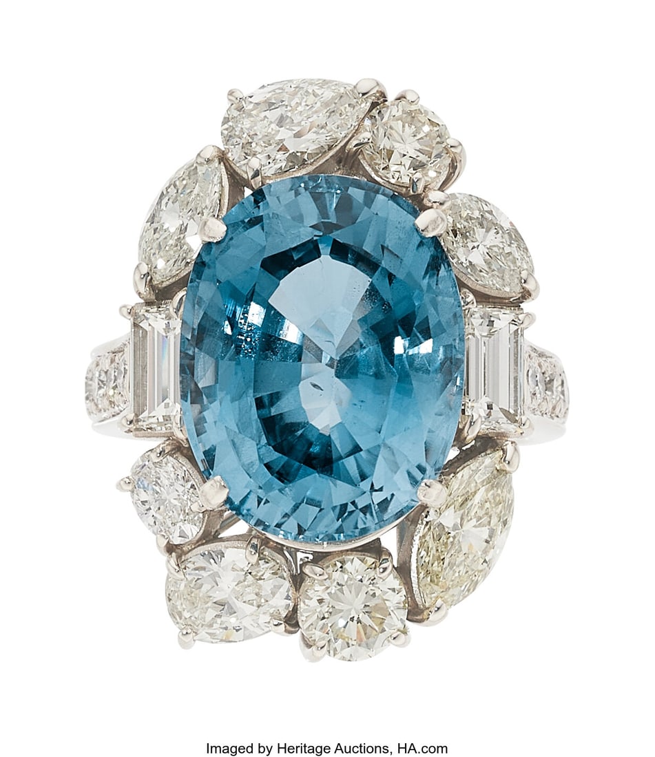Burma Sapphire, Diamond, Platinum, Palladium Rin: Burma Sapphire, Diamond, Platinum, Palladium Ring Stones: Oval-shaped sapphire weighing approximately 13.20 carats; marquise-shaped diamonds weighing a total of app