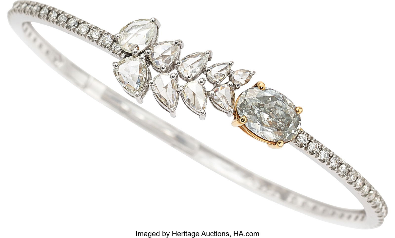 Fancy Gray Diamond, Diamond, White Gold Bracelet: Fancy Gray Diamond, Diamond, White Gold Bracelet Stones: Oval-shaped gray diamond weighing 2.12 carts; full-cut near-colorless diamonds weighing a total of approximately