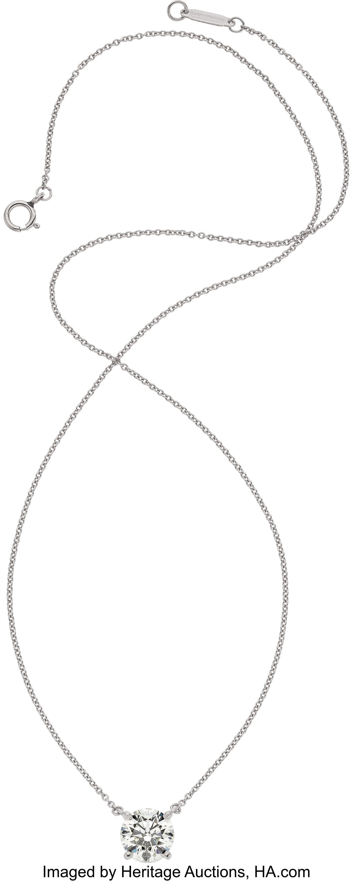 Tiffany & Co. Diamond, Platinum Necklace Stones: Tiffany & Co. Diamond, Platinum Necklace Stones: Round brilliant-cut diamond weighing 1.75 carats Metal: Platinum Marked: Tiffany & Co. Gross Weigh