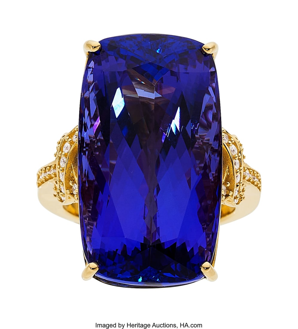 Tanzanite, Diamond, Gold Ring Stones: Cushion-s: Tanzanite, Diamond, Gold Ring Stones: Cushion-shaped tanzanite weighing 43.95 carats; full-cut diamonds weighing 0.26 carat Metal: 18k gold Gross Weight&colo