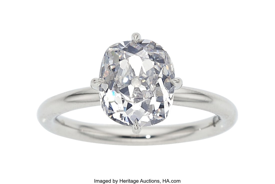 Diamond, Platinum Ring Stones: Mine-cut diamond: Diamond, Platinum Ring Stones: Mine-cut diamond weighing approximately 2.75 carats Metal: Platinum Gross Weight: 5.40 grams Size: 6 (sizeable) GIA