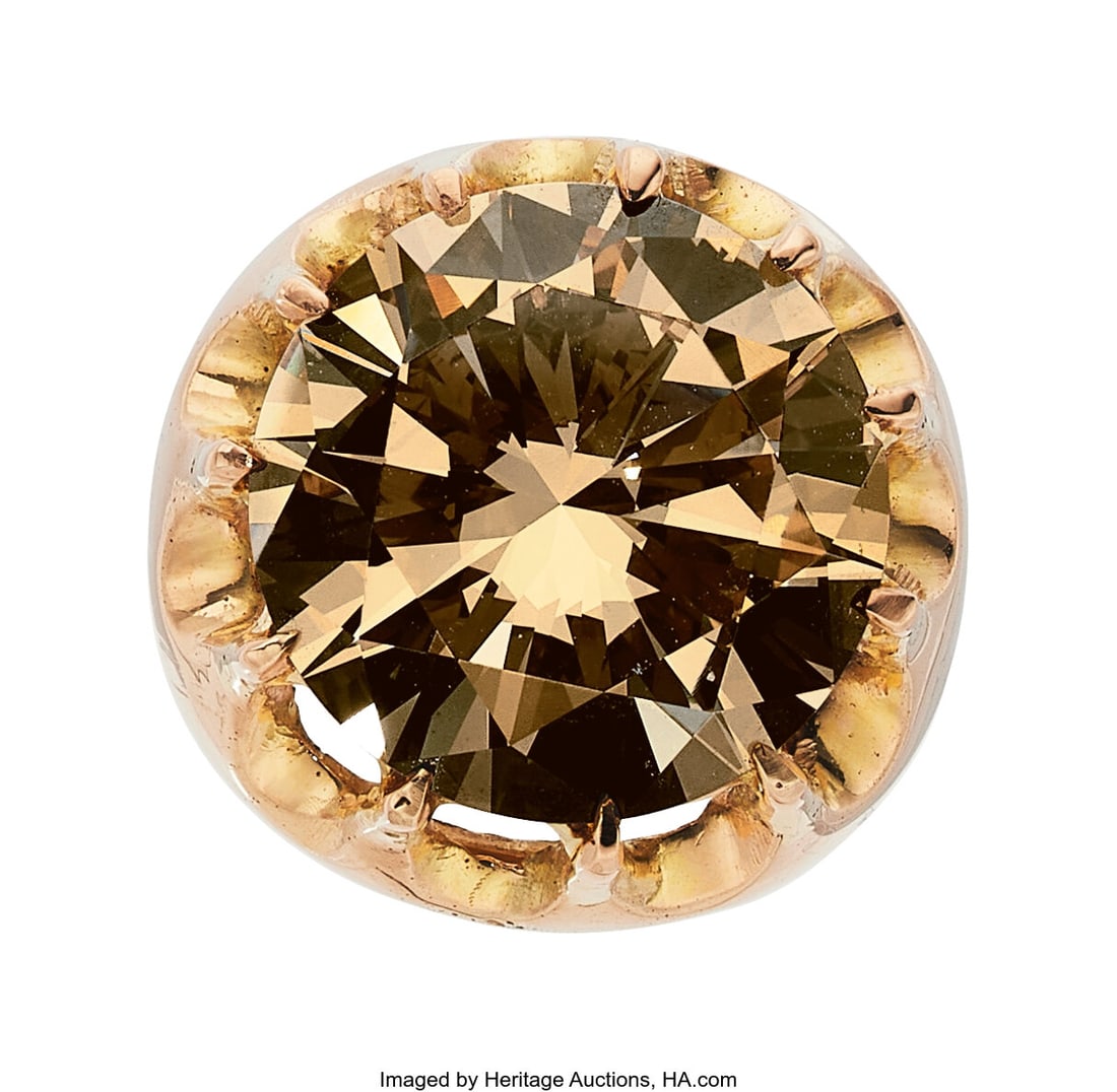Fancy Dark Yellowish Brown Diamond, Gold Ring: Fancy Dark Yellowish Brown Diamond, Gold Ring Stones: Round brilliant-cut colored diamond weighing 10.85 carats Metal: 14k gold Gross Weight: 12.50 grams Size&col