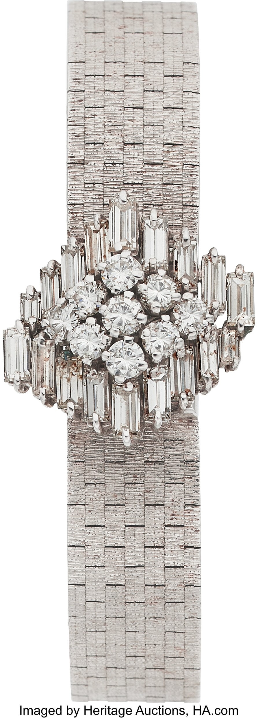 Universal Geneve Diamond, White Gold Covered Di: Universal Geneve Diamond, White Gold Covered Dial Watch Case: 15 x 12 mm, rectangle, 18k white gold, snapback, diamond-set covered dial, faceted synthetic sap