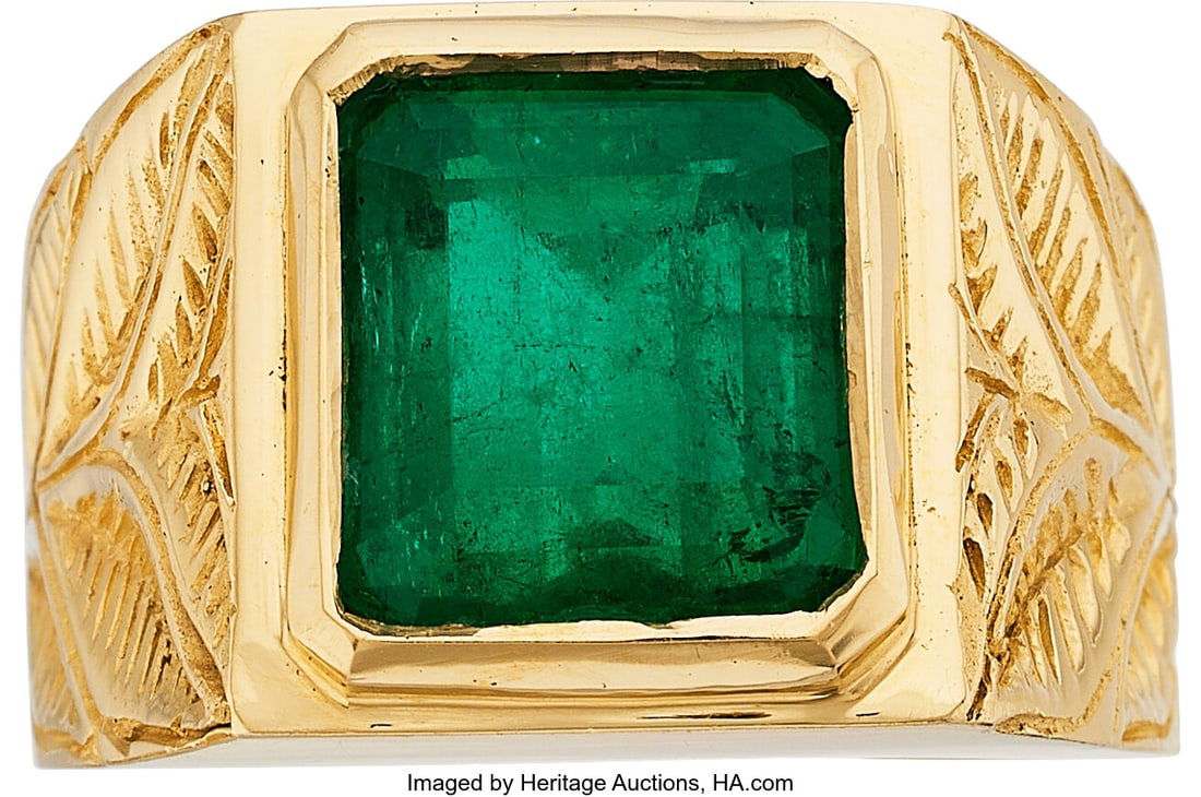 Colombian Emerald, Gold Ring Stones: Emerald-cu: Colombian Emerald, Gold Ring Stones: Emerald-cut emerald weighing approximately 7.00 carats Metal: 14k gold Gross Weight: 24.00 grams Size: 11 (sizeabl