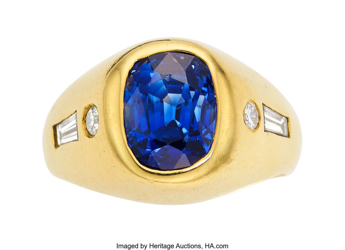 Ceylon Sapphire, Diamond, Gold Ring Stones: Cus: Ceylon Sapphire, Diamond, Gold Ring Stones: Cushion-shaped sapphire weighing approximately 8.50 carats; baguette and full-cut diamonds weighing a total of approximately 0