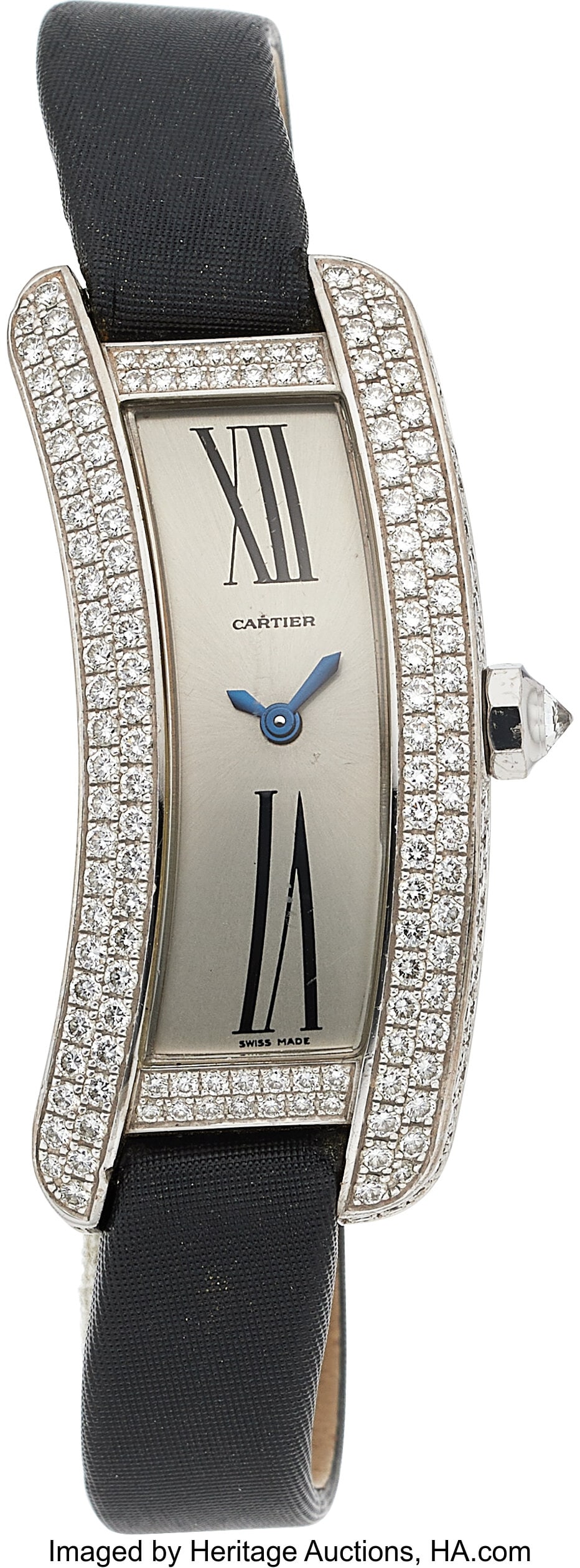 Cartier Diamond, White Gold Tank-S Americaine Wa: Cartier Diamond, White Gold Tank-S Americaine Watch Case: 16 x 40 mm, curved rectangle, 18k white gold, back secured by 8 screws, inverted diamond crown, diam