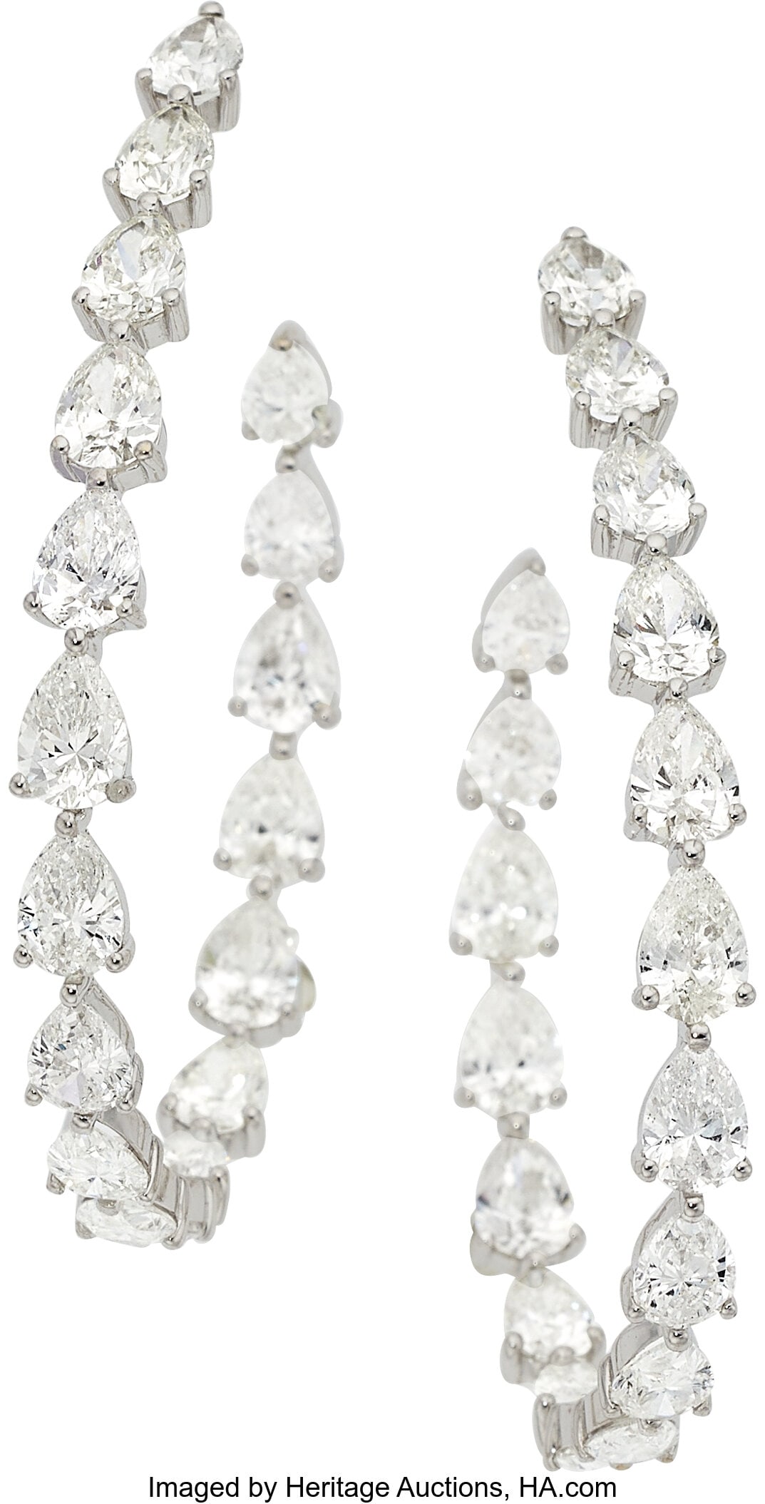 Diamond, White Gold Earrings Stones: Pear-shap: Diamond, White Gold Earrings Stones: Pear-shaped diamonds weighing a total of approximately 9.50 carats Metal: 18k white gold Gross Weight: 9.80 grams Dimensions&