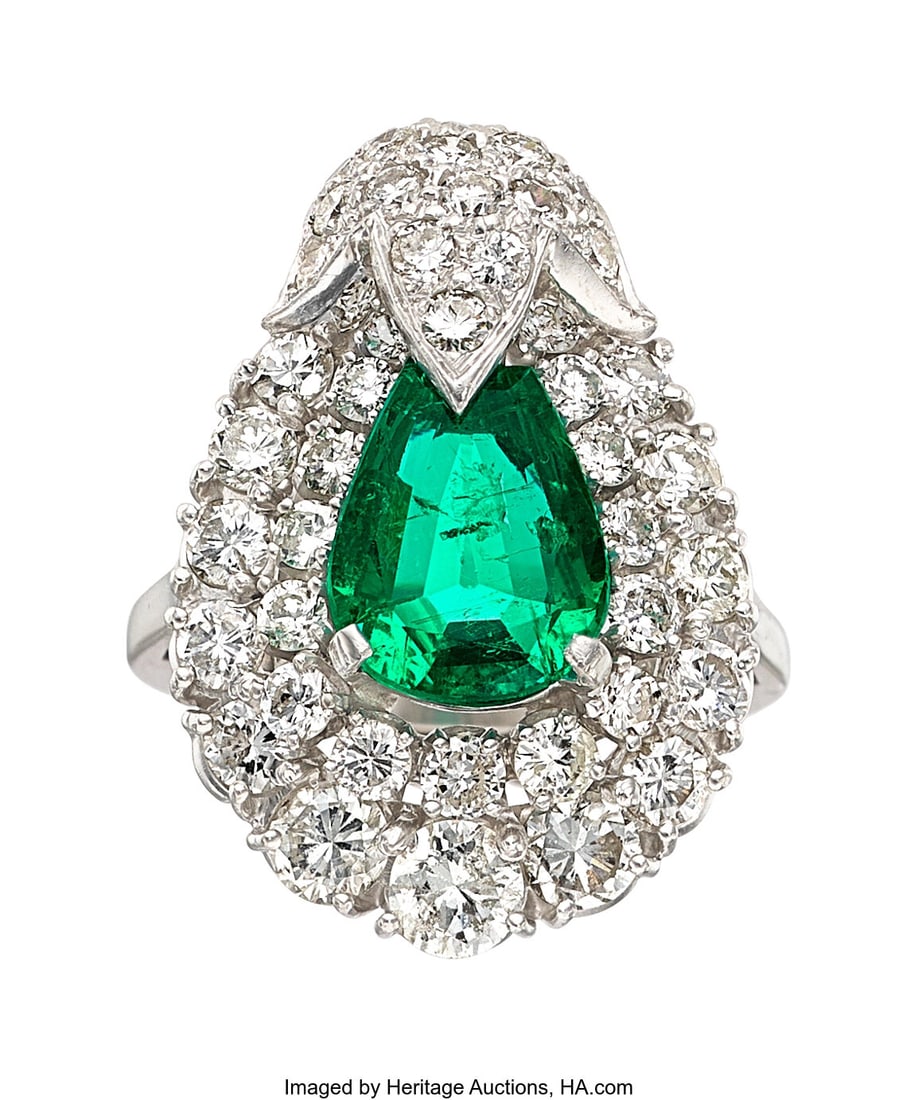 Emerald, Diamond, Platinum Ring Stones: Modifie: Emerald, Diamond, Platinum Ring Stones: Modified pear-shaped emerald; full-cut diamonds weighing a total of approximately 2.65 carats Metal: Platinum Gross Weight&c