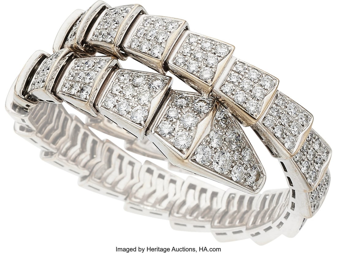 Bvlgari Diamond, White Gold Bracelet Stones: Fu: Bvlgari Diamond, White Gold Bracelet Stones: Full-cut diamonds weighing a total of approximately 8.00 carats Metal: 18k white gold Marked: Bvlgari Collection: Serp