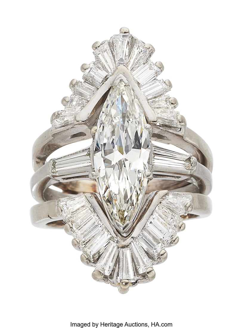Diamond, Platinum Ring Set Stones: Marquise-sha: Diamond, Platinum Ring Set Stones: Marquise-shaped diamond weighing 2.00 carats; baguette-cut diamonds weighing a total of approximately 0.60 carat; tapered baguett