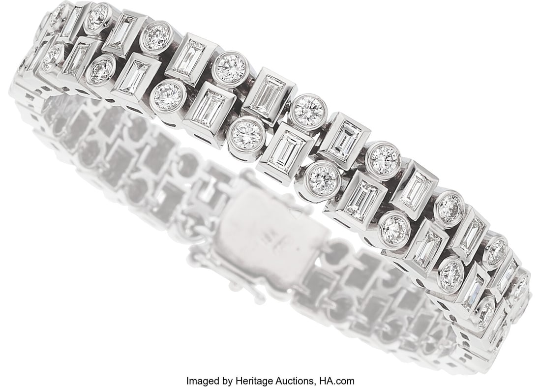 Diamond, White Gold Bracelet Stones: Baguette-c: Diamond, White Gold Bracelet Stones: Baguette-cut diamonds weighing a total of approximately 4.75 carats; full-cut diamonds weighing a total of approximately 3.25 carats