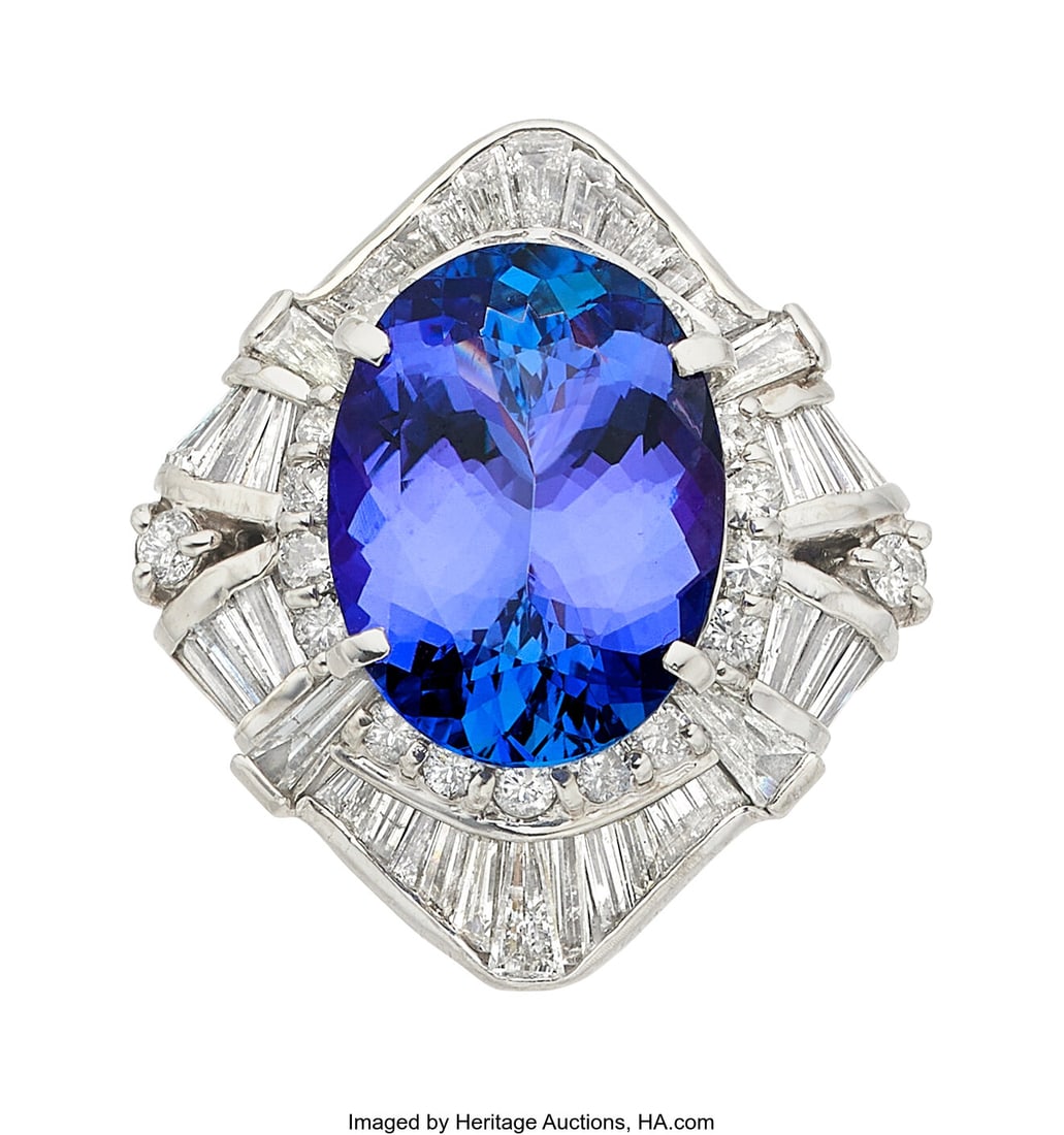 Tanzanite, Diamond, Platinum Ring Stones: Oval-: Tanzanite, Diamond, Platinum Ring Stones: Oval-shaped tanzanite weighing approximately 8.15 carats; baguette and full-cut diamonds weighing a total of approximately 3&per