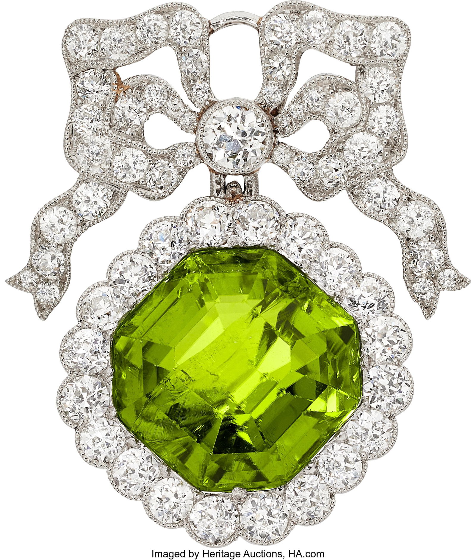 Edwardian Peridot, Diamond, Platinum, White Gol: Edwardian Peridot, Diamond, Platinum, White Gold Pendant-Brooch Stones: Square emerald-cut peridot weighing approximately 14.50 carats; European and transitional-cu