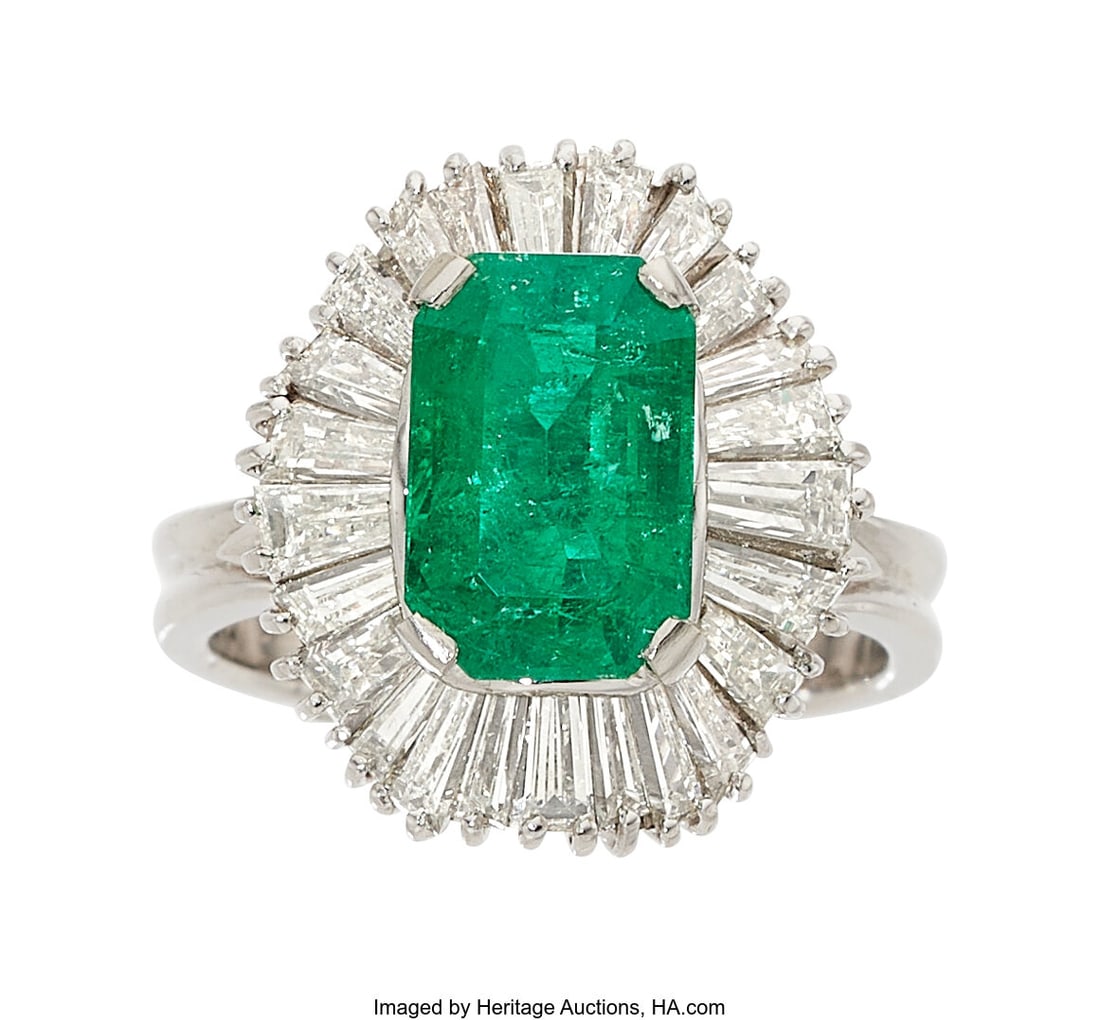 Colombian Emerald, Diamond, Platinum Ring Stone: Colombian Emerald, Diamond, Platinum Ring Stones: Octagonal-shaped emerald weighing 2.61 carats; baguette-cut diamonds weighing a total of approximately 1.50 carat