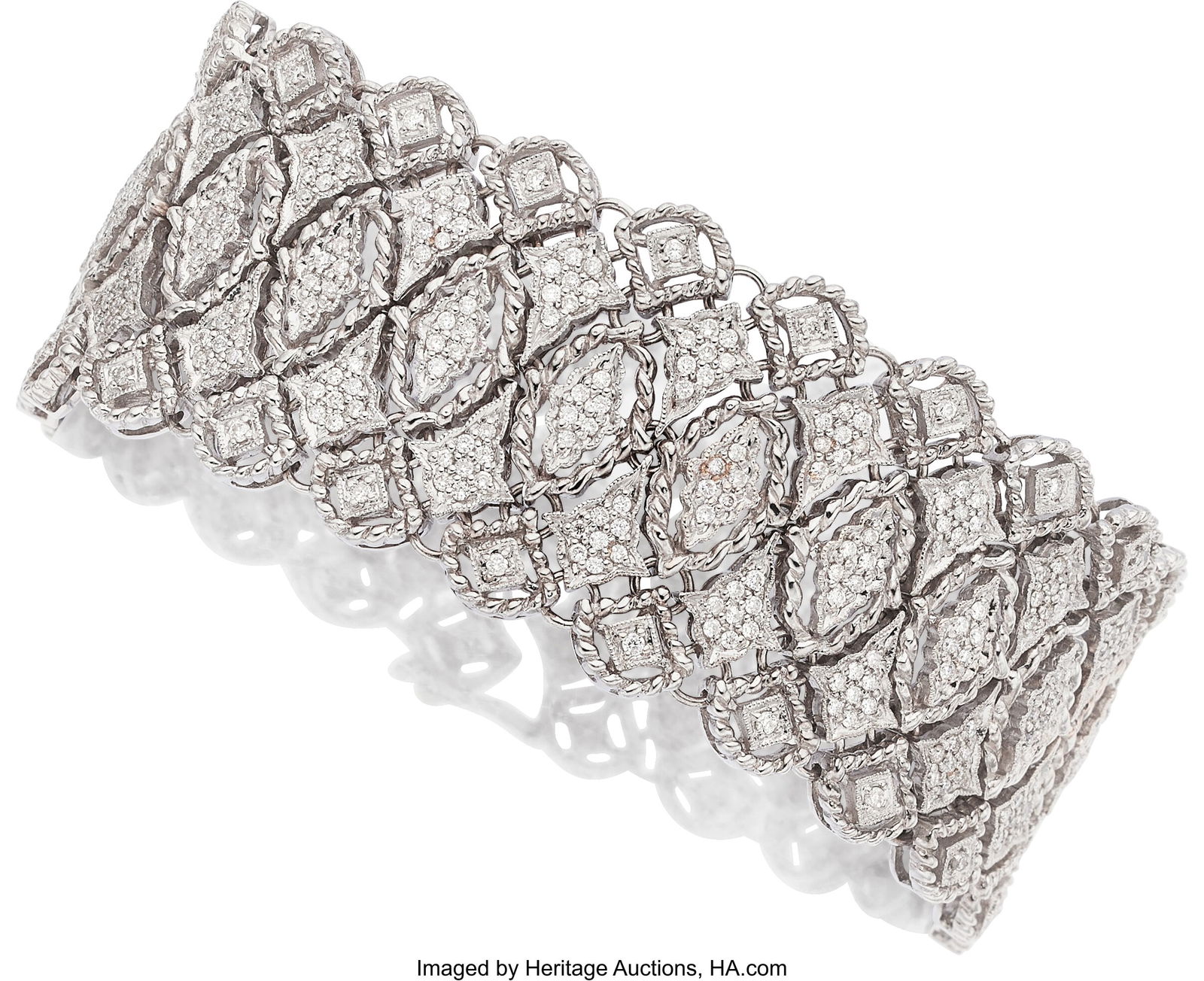 Diamond, White Gold Bracelet Stones: Full-cut d: Diamond, White Gold Bracelet Stones: Full-cut diamonds weighing a total of approximately 4.50 carats Metal: 18k white gold Gross Weight: 62.90 grams Dimensions&co