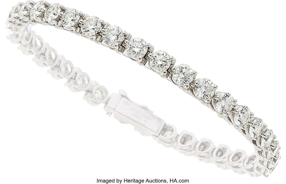 Cartier Diamond, White Gold Bracelet, French St: Cartier Diamond, White Gold Bracelet, French Stones: Round brilliant-cut diamonds weighing a total of approximately 8.50 carats Metal: 18k white gold Marked: Carti