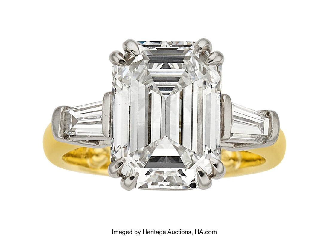 Diamond, Platinum, Gold Ring Stones: Emerald-cu: Diamond, Platinum, Gold Ring Stones: Emerald-cut diamond weighing 4.55 carats; tapered baguette-cut diamonds weighing a total of approximately 0.30 carat Metal&col