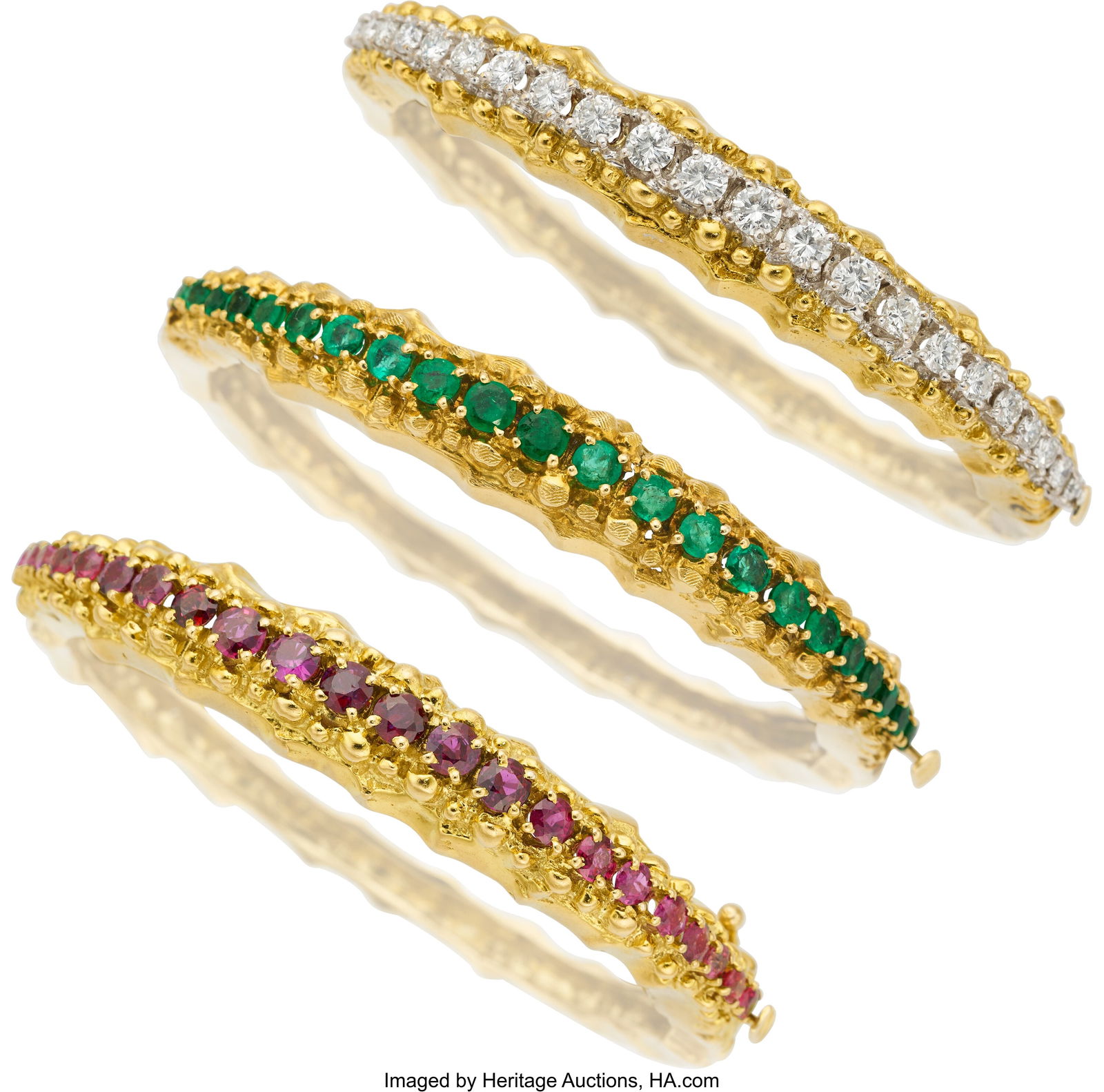 Diamond, Emerald, Ruby, Gold Bracelets Stones: Diamond, Emerald, Ruby, Gold Bracelets Stones: Full-cut diamonds weighing a total of approximately 2.50 carats; round-shaped emeralds weighing a total of approximat