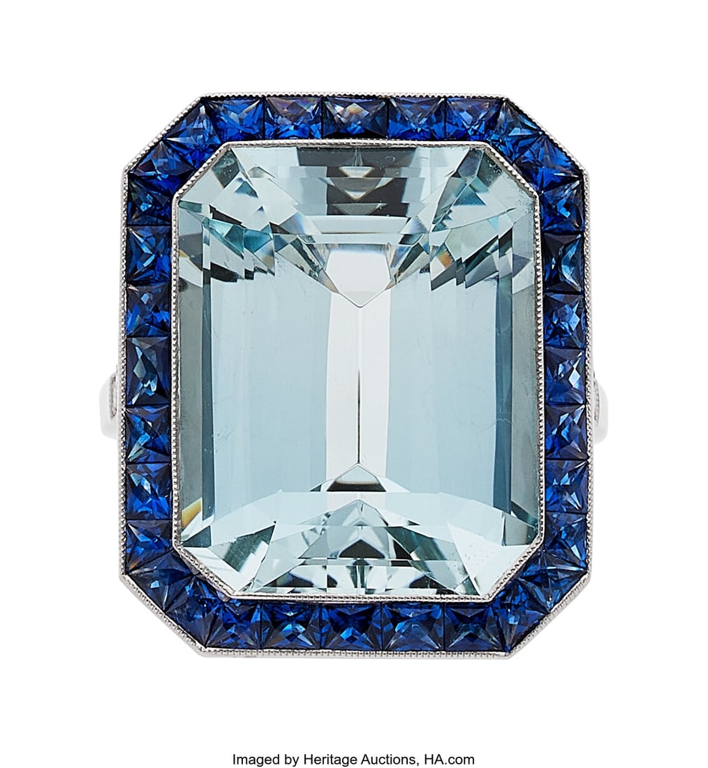 Sabrina Aquamarine, Sapphire, Diamond, Platinum: Sabrina Aquamarine, Sapphire, Diamond, Platinum Ring Stones: Octagonal-shaped aquamarine weighing 14.55 carats; French and calibré-cut sapphires weighing a t